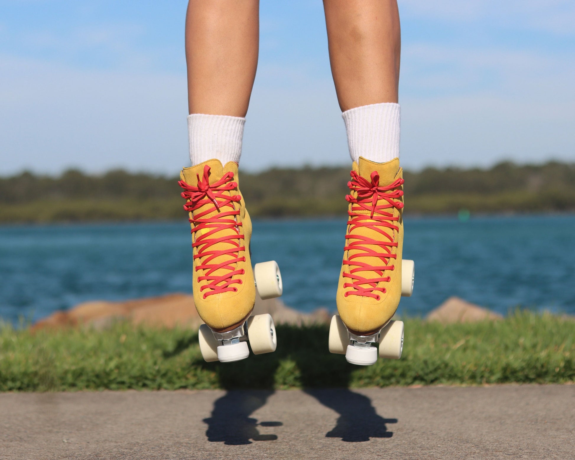 Chuffed Skates yellow roller skates jumping